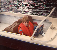 Christopher Horrel as a young man, in a boat